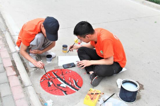 河南农业大学：开展公益彩绘，振兴美丽乡村